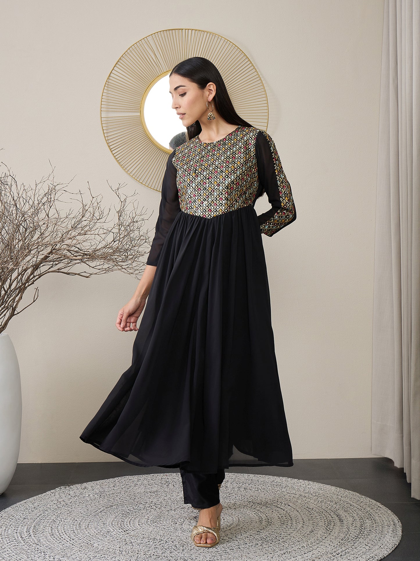 Women Embroidered Empire Kurta with Trousers