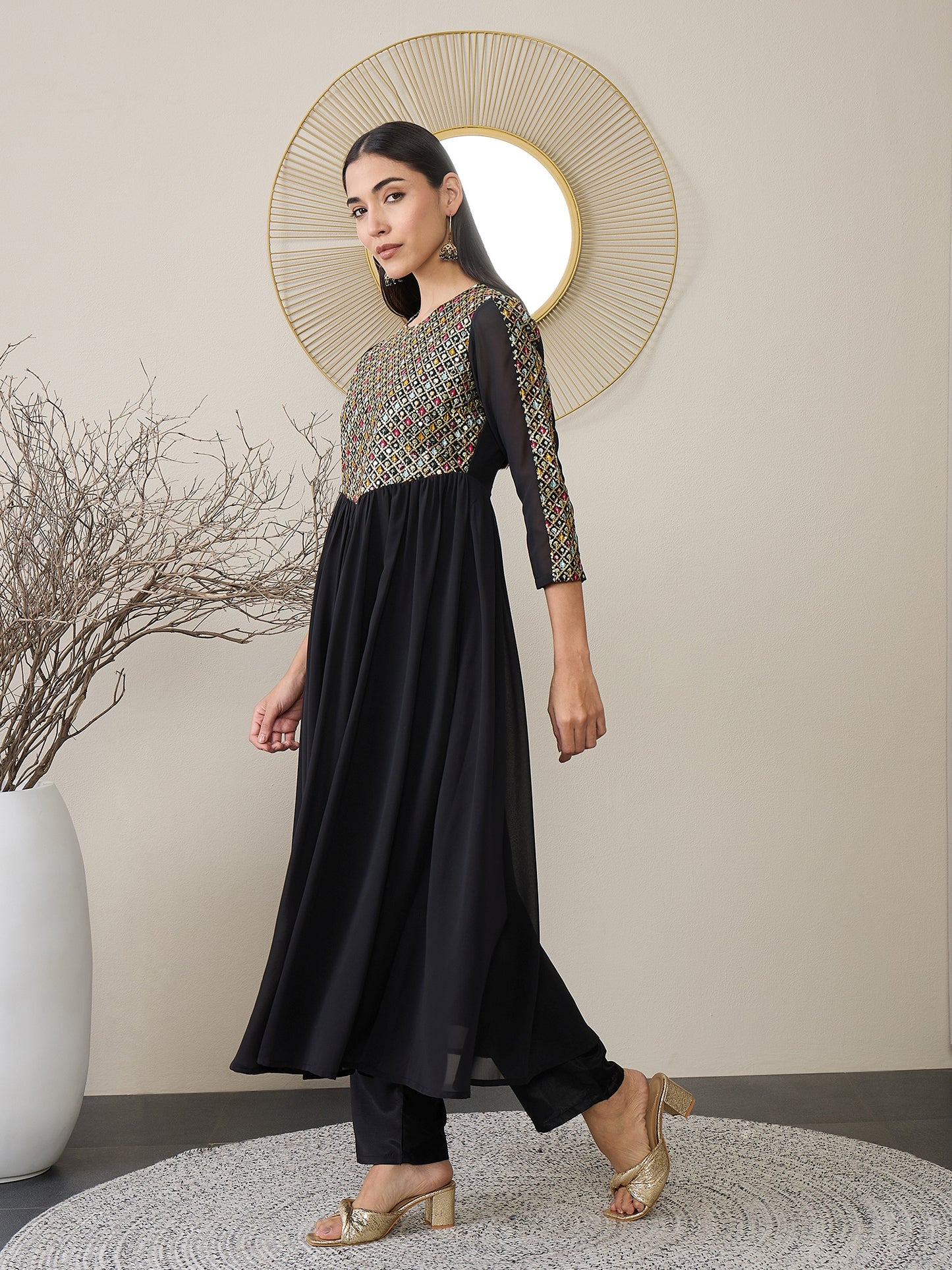 Women Embroidered Empire Kurta with Trousers
