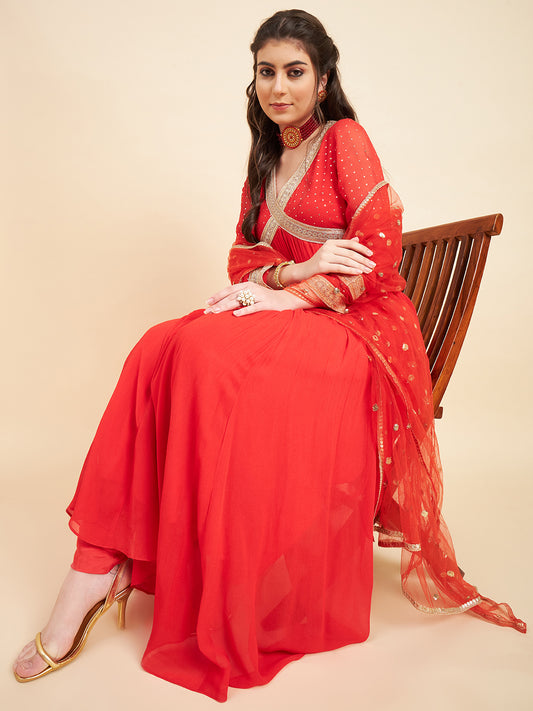 Orange Aliya Cut Design Kurta With Churidar Paired With Dupatta